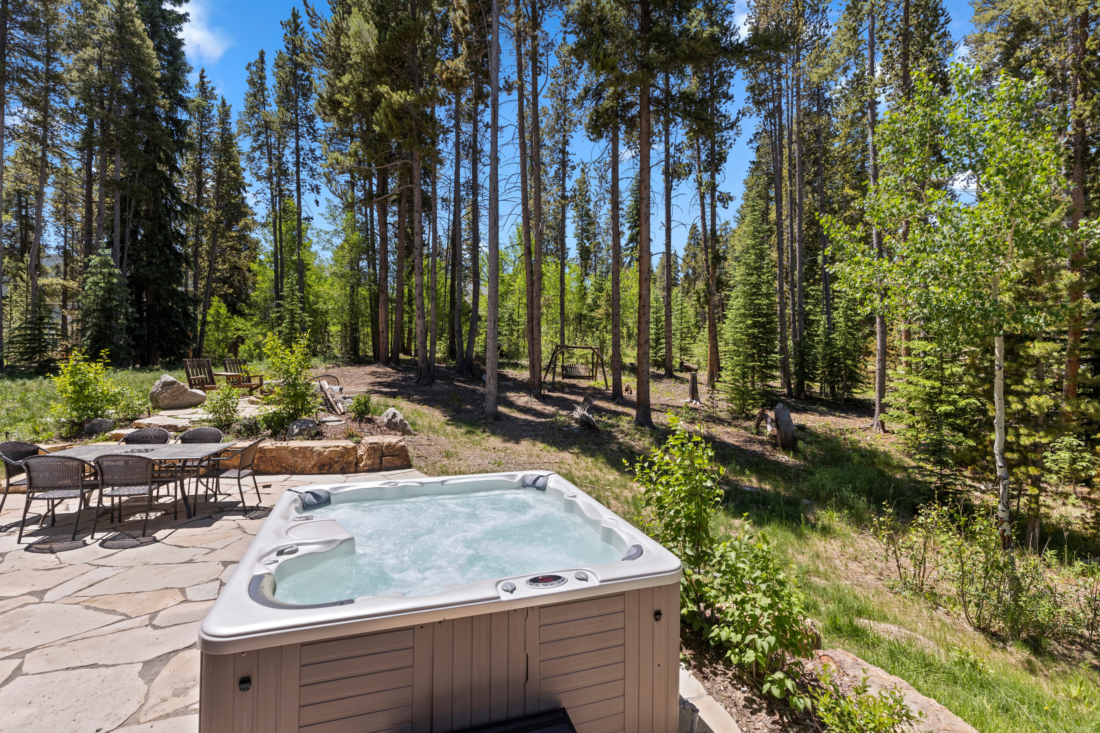 Private hot tub surrounded by trees